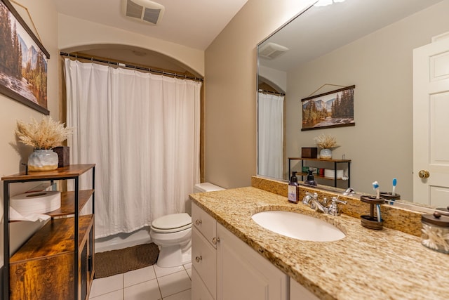 9430 Reserve Dr, Caledonia, IL 61011 - full bathroom featuring tile patterned flooring, toilet, and vanity