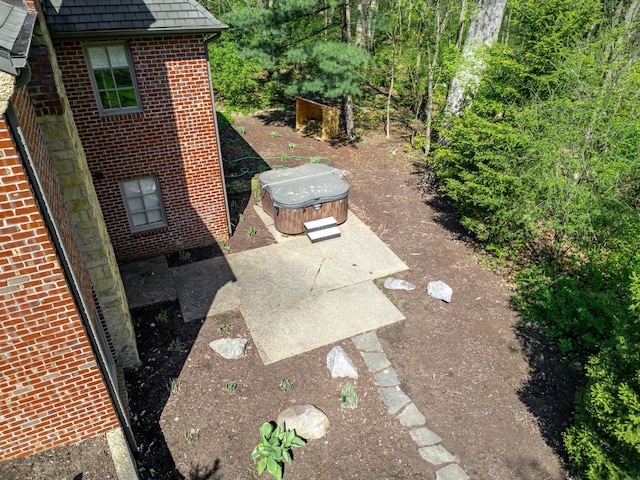 9430 Reserve Dr, Caledonia, IL 61011 - view of yard with a hot tub and a patio