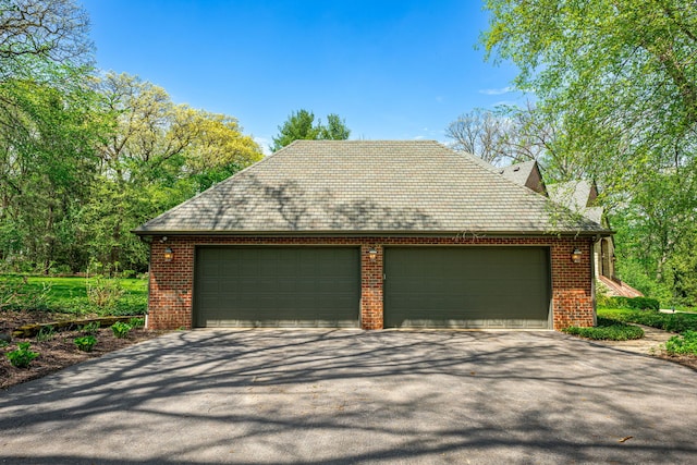 9430 Reserve Dr, Caledonia, IL 61011 - garage featuring driveway