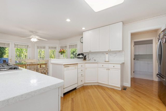 2164 Tellis Ln, Lisle, IL 60532 - kitchen with appliances with stainless steel finishes, healthy amount of natural light, white cabinets, a ceiling fan, and recessed lighting