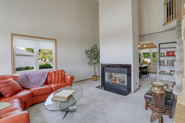 1372 Pheasant Chase Cir, Beecher, IL 60401 - living room with a high ceiling, carpet, and a multi sided fireplace