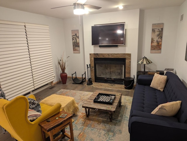 1372 Pheasant Chase Cir, Beecher, IL 60401 - living area with ceiling fan, a glass covered fireplace, and wood finished floors