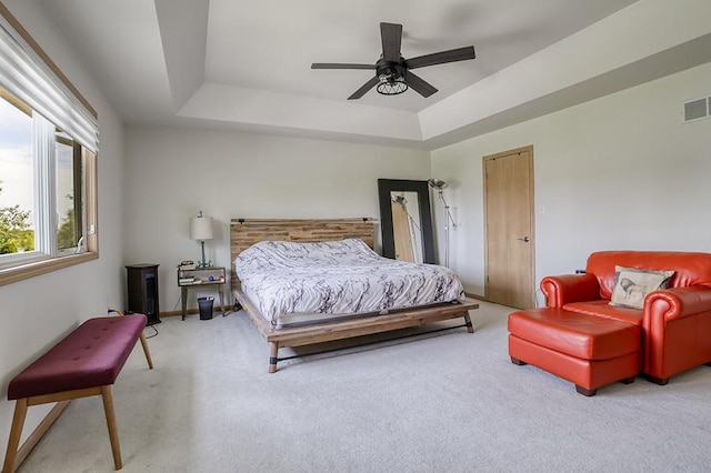 1372 Pheasant Chase Cir, Beecher, IL 60401 - carpeted bedroom with a tray ceiling and a ceiling fan