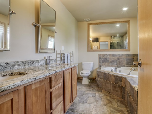 1372 Pheasant Chase Cir, Beecher, IL 60401 - full bathroom with stone finish floors, double vanity, a bath, and recessed lighting