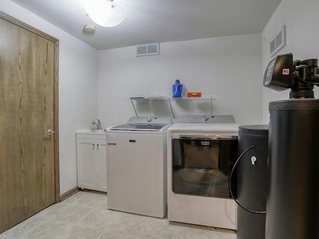 1372 Pheasant Chase Cir, Beecher, IL 60401 - washroom with washing machine and dryer, cabinet space, and light tile patterned floors
