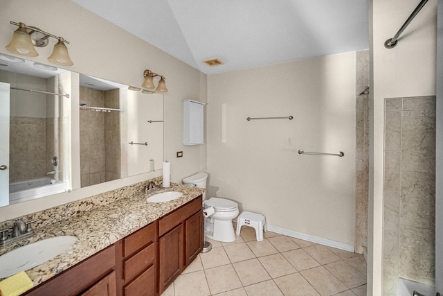 7658 S Greenwood Ave, Chicago, IL 60619 - full bathroom with tile patterned flooring, toilet, double vanity, and baseboards