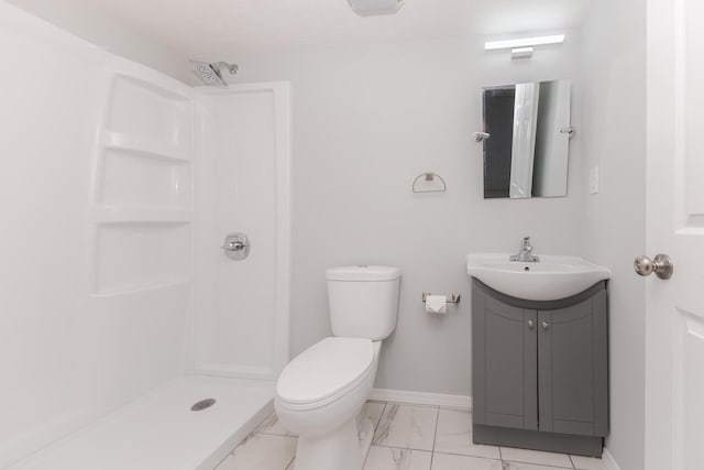 bathroom with a shower stall, baseboards, marble finish floors, toilet, and vanity
