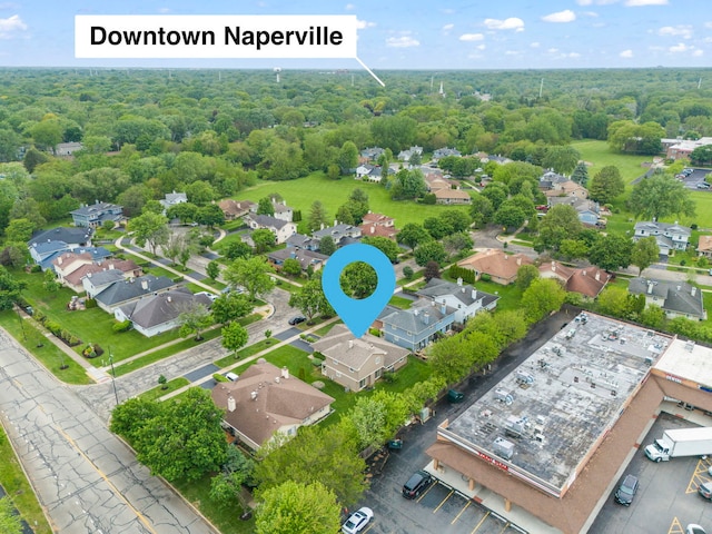 1592 Lighthouse Dr, Naperville, IL 60565 - aerial perspective of suburban area with a heavily wooded area