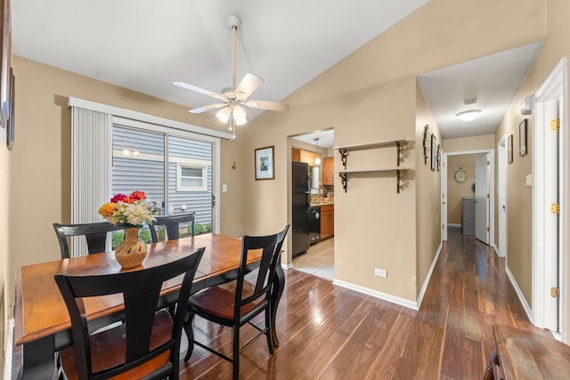 1592 Lighthouse Dr, Naperville, IL 60565 - dining space featuring dark wood-type flooring, a ceiling fan, vaulted ceiling, and baseboards