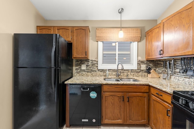1592 Lighthouse Dr, Naperville, IL 60565 - kitchen with black appliances, a sink, backsplash, and light stone countertops