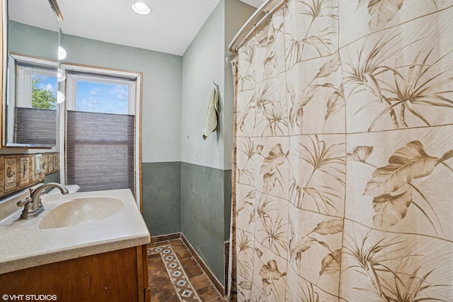 827 Lewis St, Dekalb, IL 60115 - full bath featuring vanity and baseboards