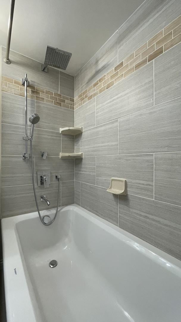 6221 N Niagara Ave Unit 401, Chicago, IL 60631 - bathroom featuring a shower and a tub