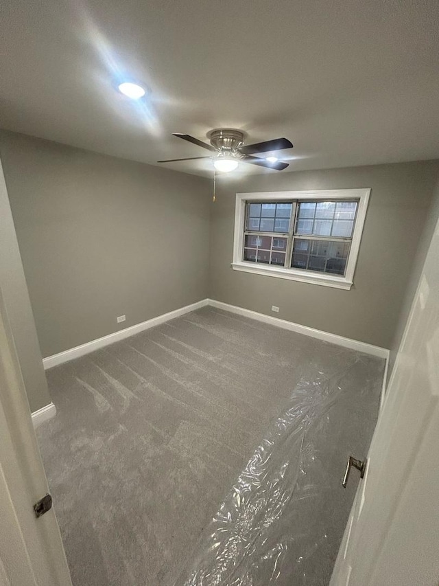 6135 W 94th St Unit C6, Oak Lawn, IL 60453 - carpeted spare room featuring baseboards and a ceiling fan