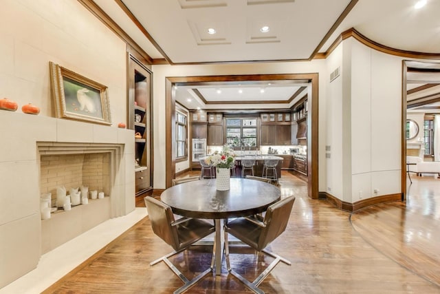 6535 N Tower Circle Dr, Lincolnwood, IL 60712 - dining area with ornamental molding, wood finished floors, and recessed lighting