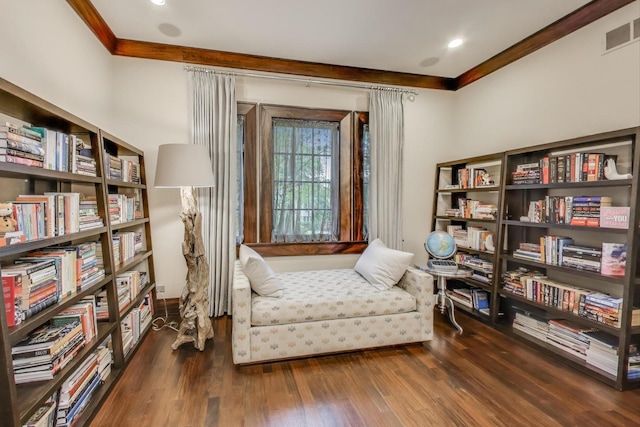 6535 N Tower Circle Dr, Lincolnwood, IL 60712 - sitting room featuring crown molding, wall of books, and wood finished floors