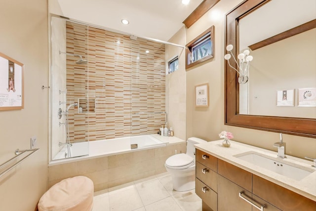 6535 N Tower Circle Dr, Lincolnwood, IL 60712 - bathroom featuring toilet, tiled shower / bath combo, vanity, tile patterned floors, and recessed lighting