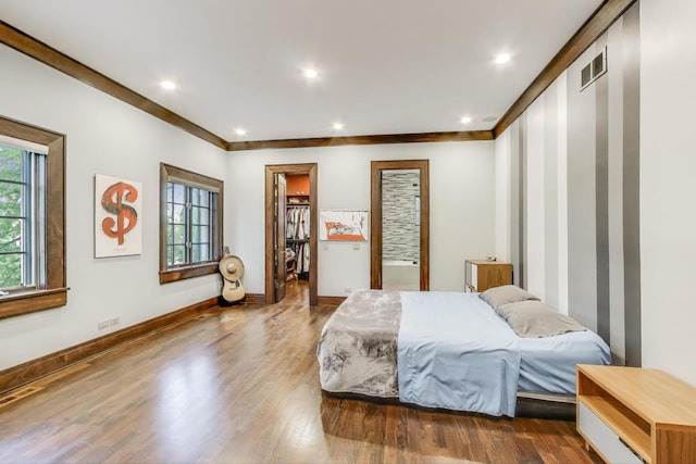 6535 N Tower Circle Dr, Lincolnwood, IL 60712 - bedroom with multiple windows, wood finished floors, baseboards, ornamental molding, and recessed lighting