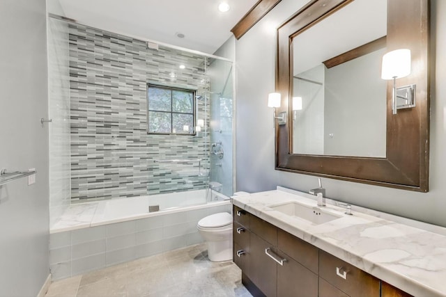 6535 N Tower Circle Dr, Lincolnwood, IL 60712 - bathroom featuring toilet, vanity, tiled shower / bath combo, tile patterned flooring, and recessed lighting