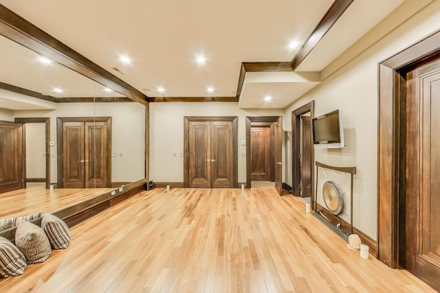 6535 N Tower Circle Dr, Lincolnwood, IL 60712 - unfurnished living room with light wood-type flooring and baseboards