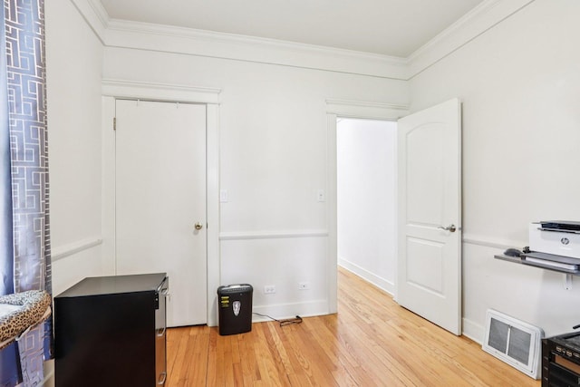 38 Highview Ave, Fox Lake, IL 60020 - unfurnished bedroom with light wood-type flooring and ornamental molding