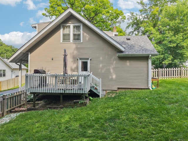38 Highview Ave, Fox Lake, IL 60020 - rear view of property featuring a deck, a shingled roof, and a chimney