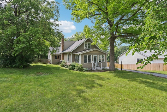 38 Highview Ave, Fox Lake, IL 60020 - rear view of property with a chimney