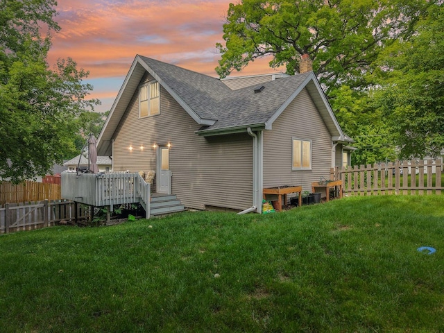 38 Highview Ave, Fox Lake, IL 60020 - rear view of house with a shingled roof, a chimney, and a wooden deck