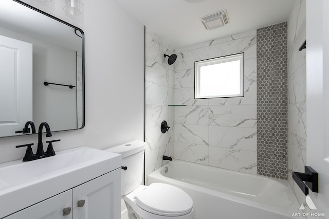 bathroom with toilet, shower / tub combination, and vanity