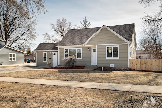 view of front of property with roof with shingles