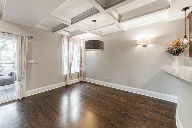 6337 N Magnolia Ave Unit 2, Chicago, IL 60660 - unfurnished dining area featuring healthy amount of natural light, beam ceiling, dark wood-style flooring, coffered ceiling, and crown molding