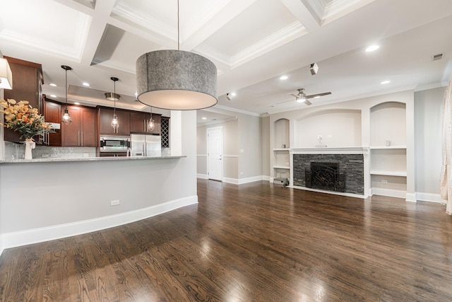 6337 N Magnolia Ave Unit 2, Chicago, IL 60660 - unfurnished living room with crown molding, recessed lighting, ceiling fan, a fireplace, and dark wood-type flooring