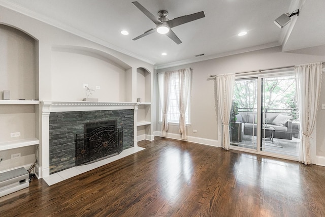 6337 N Magnolia Ave Unit 2, Chicago, IL 60660 - unfurnished living room featuring crown molding, ceiling fan, a fireplace, built in features, and healthy amount of natural light