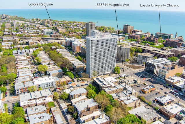 view of urban area featuring a nearby body of water