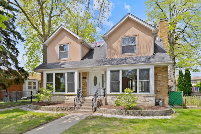 7810 Kildare Ave, Skokie, IL 60076 - view of front of property featuring a chimney, stone siding, roof with shingles, and stucco siding