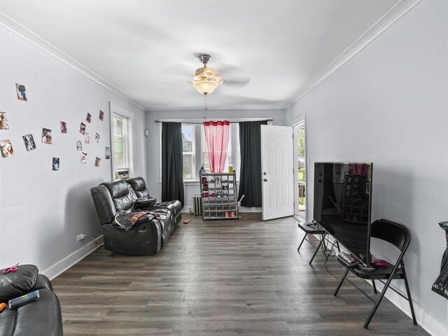 112 Webb St, Calumet City, IL 60409 - living area featuring crown molding, healthy amount of natural light, baseboards, a ceiling fan, and wood finished floors