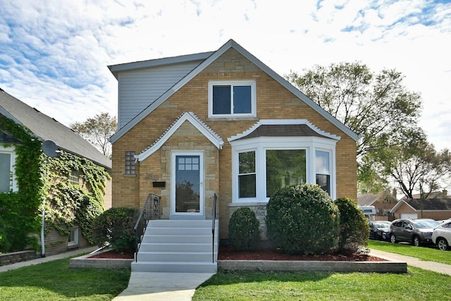 3001 N Neenah Ave, Chicago, IL 60634 - view of front of home with stone siding and a front lawn