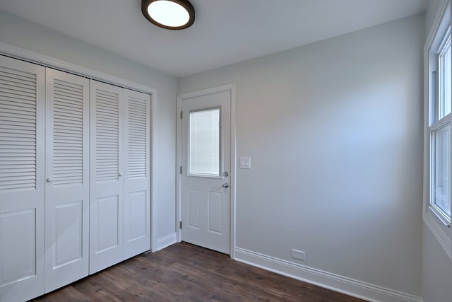 3001 N Neenah Ave, Chicago, IL 60634 - entryway with dark wood-style floors and baseboards