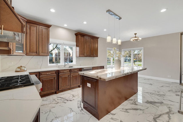 471 Stagecoach, Glen Ellyn, IL 60137 - kitchen featuring light marble finish floors, backsplash, recessed lighting, a center island, and plenty of natural light