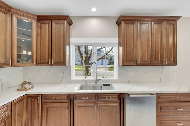 471 Stagecoach, Glen Ellyn, IL 60137 - kitchen featuring a sink, dishwasher, glass insert cabinets, decorative backsplash, and light stone countertops
