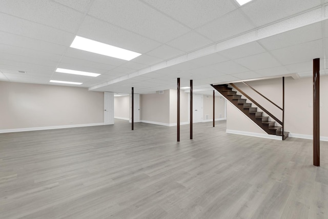 471 Stagecoach, Glen Ellyn, IL 60137 - finished below grade area with baseboards, stairway, wood finished floors, and a drop ceiling