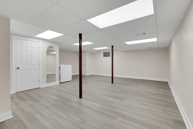 471 Stagecoach, Glen Ellyn, IL 60137 - finished below grade area with washer / clothes dryer, a drop ceiling, light wood-style floors, and baseboards