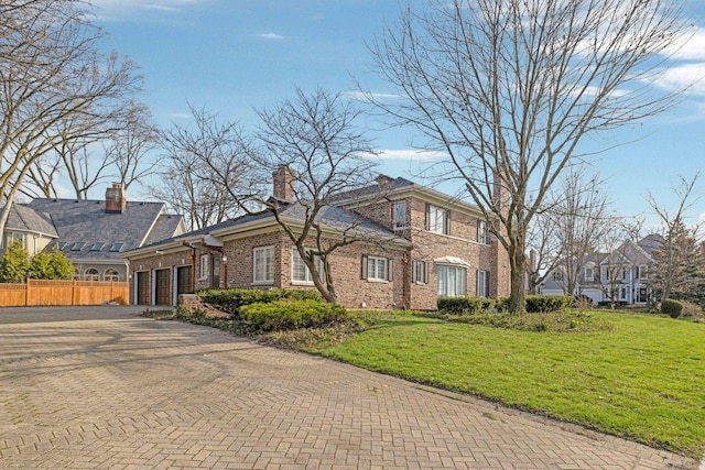 471 Stagecoach, Glen Ellyn, IL 60137 - view of front of home with an attached garage, decorative driveway, and brick siding