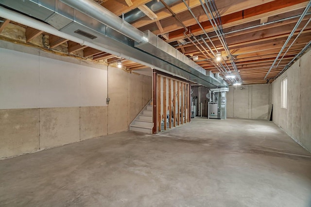 28 S Van Nortwick Ave, Batavia, IL 60510 - basement with heating unit, stairway, and water heater