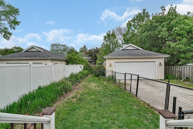 28 S Van Nortwick Ave, Batavia, IL 60510 - view of yard featuring a garage and an outdoor structure