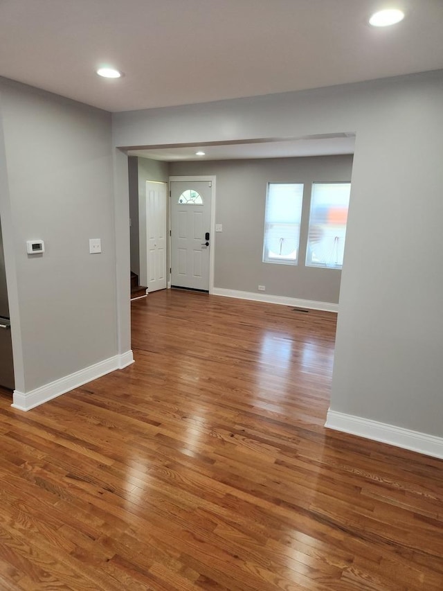 939 W 123rd St, Calumet Park, IL 60827 - foyer entrance with wood finished floors, baseboards, and recessed lighting