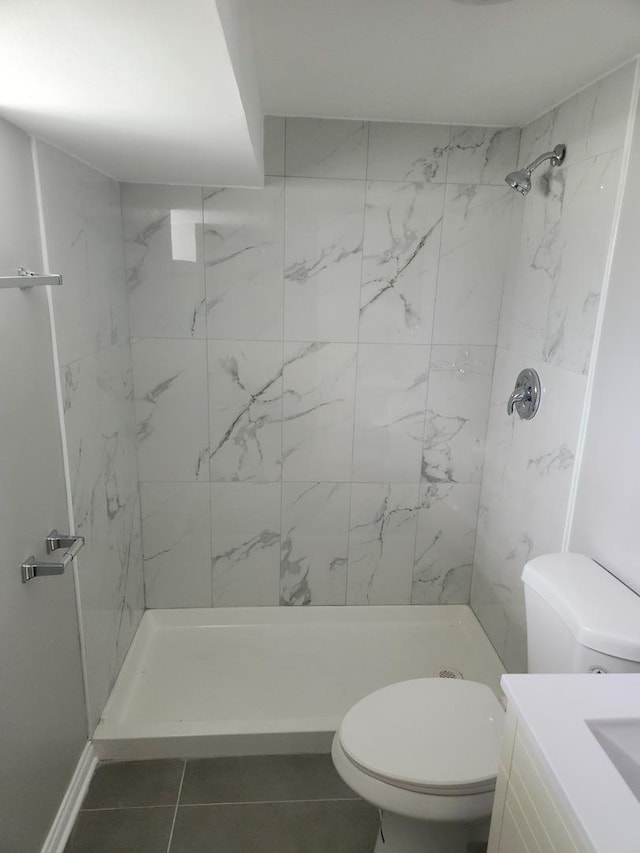 939 W 123rd St, Calumet Park, IL 60827 - bathroom featuring toilet, a shower stall, tile patterned flooring, and vanity