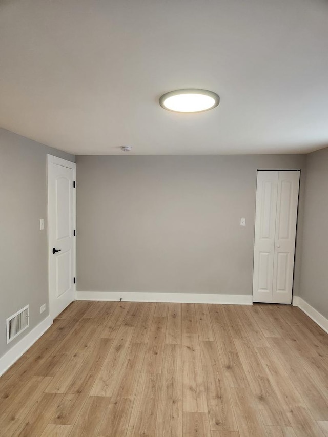 939 W 123rd St, Calumet Park, IL 60827 - spare room with light wood-type flooring and baseboards