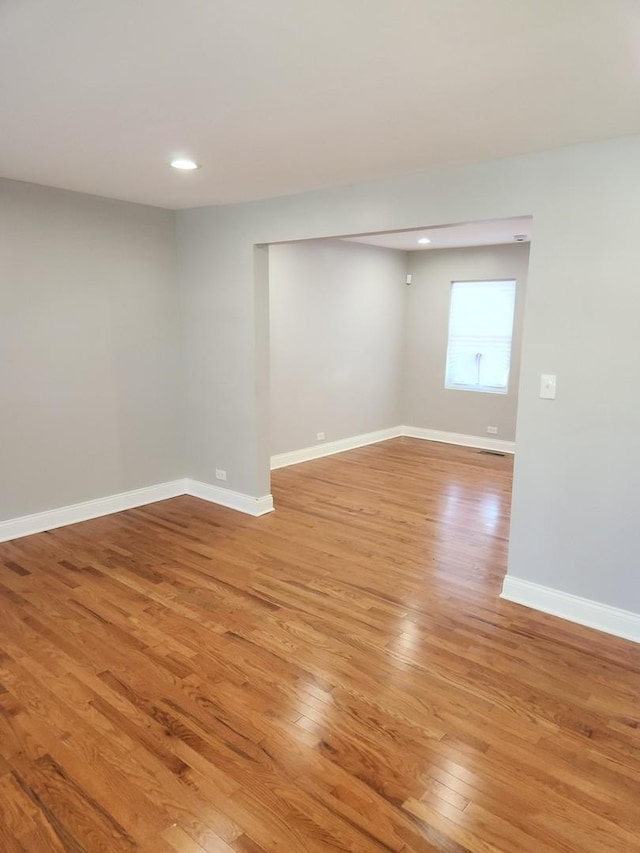 939 W 123rd St, Calumet Park, IL 60827 - unfurnished room with light wood-type flooring, baseboards, and recessed lighting