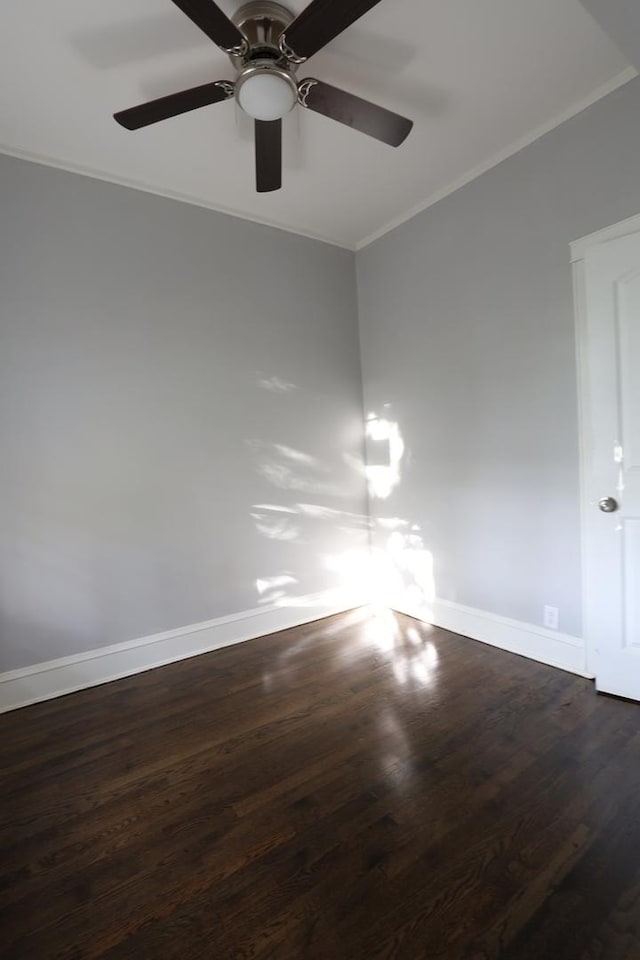 5613 S Wood St, Chicago, IL 60636 - empty room with baseboards, crown molding, wood finished floors, and a ceiling fan