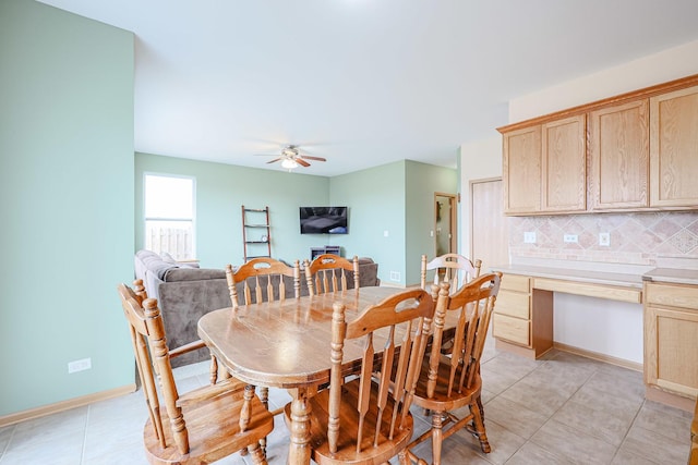 10941 Preston Pkwy, Huntley, IL 60142 - dining space featuring light tile patterned floors, a ceiling fan, and baseboards
